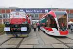 2744 005-5 (EffiShunter 1000), hergestellt von CZ LOKO, a.s., der Mercitalia Rail trifft auf Straßenbahnwagen 71-911EM  Lionet , hergestellt von PC Transport systems LLC, auf dem Gleis- und Freigelände der Messe Berlin anlässlich des  Tags des Eisenbahners  im Rahmen der Publikumstage zur InnoTrans 2018.
[23.9.2018 | 13:34 Uhr]