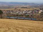 Eine 754  mit einem Rx nach Prag am 08.03.2015 unterwegs bei Dešenice.