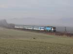 Die 754 058 mit einem R nach Prag am 03.01.2014 unterwegs bei Petrovice nad Úhlavou