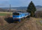 754 015 mit einem R nach Prag am 26.02.2014 bei Hodousice.