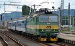 163 096 erreicht mit einem Regionalzug aus Prag am 04.07.13 Decin.