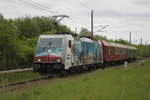 386 020-2 mit dem mini SDZ 74213 von Hamburg-Harburg nach Warnemünde bei der Durchfahrt in Rostock-Lichtenhagen.25.05.2019