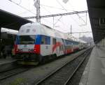 471 011-7 steht als S2 nach Kolin in Praha Masarykovo ndra bereit am 22.12.2012. Neues Design.