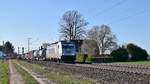 METRANS Rail 386 029 mit Containerzug in Richtung Hannover (bei Stadthagen, 27.02.19).