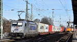 METRANS Rail s.r.o., Praha [CZ] mit ihrer  386 015-2  [NVR-Nummer: 91 54 7386 015-2 CZ-MT] und einem Containerzug am 29.01.24 bei der Vorbeifahrt Bahnhof Magdeburg Neustadt.