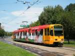 BKV 1551 (TW6000) Olympische Straenbahn an der Linie 61, zwischen Bahnhof Budapest-Dli und Moszkva tr, am 04. 08. 2012.  