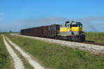 308 between Moore Haven and Clewiston with a train of laden sugarcane,  22 Nov 2017