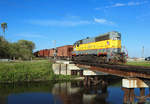 504 passes South Bay whilst working the Clewiston - Fort Pierce local, 28 Nov 2017