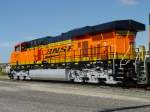 BNSF 5757 rests quietly at the siding near the Burlington, Iowa depot as its coal train is being unloaded at the generating plant south of town.