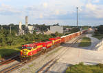 After waiting for a southbound train to pass, 819 & 810 depart New Smyrna Beach with train FEC202-04, 4 July 2018    Train 202-04 left Miami at 1230 and will arrive in Jacksonville around 2130.