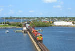 Running a couple of hours late, FEC109-19 crosses the St Lucie River in Stuart whilst making it`s way from Jacksonville Bowden to Miami Hialeah, 19 Feb 2019.