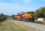 818 & 823 approach New Smyrna Beach whilst working FEC train 101-12 from Jacksonville Bowden to Miami Hialeah,  12 Feb 2019.