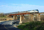 Amtrak no 67 crosses the Blanco River near San Marcos whilst hauling the Texas Eagle from San Antonio to Chicago, 14 March 2028