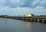 Bright Blue crosses the St Lucie River in Stuart whilst working BL500, a crew training train from Cocoa to West Palm Beach, 10 March 2022