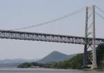 29.6.2012 Bear Mountain, NY. Ein Amtrak Zug nach NYC Penn Station (Empire Service) kurz vor der Unterquerung der Bear Mountain Bridge. Hitze und hohe Luftfeuchtigkeit beeintrchtigten etwas die Sichtqualitt.